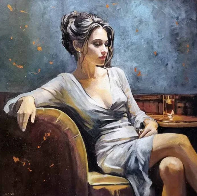 kobieta siedząca na sofie